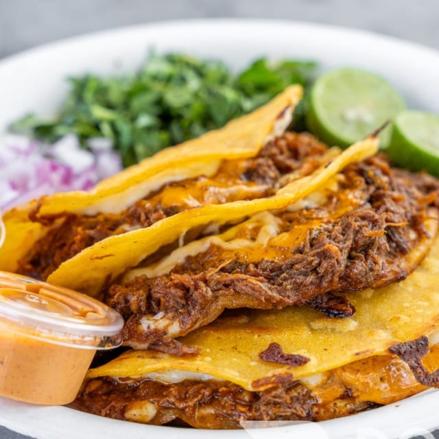 Birria Rojo Cheesy Taco.